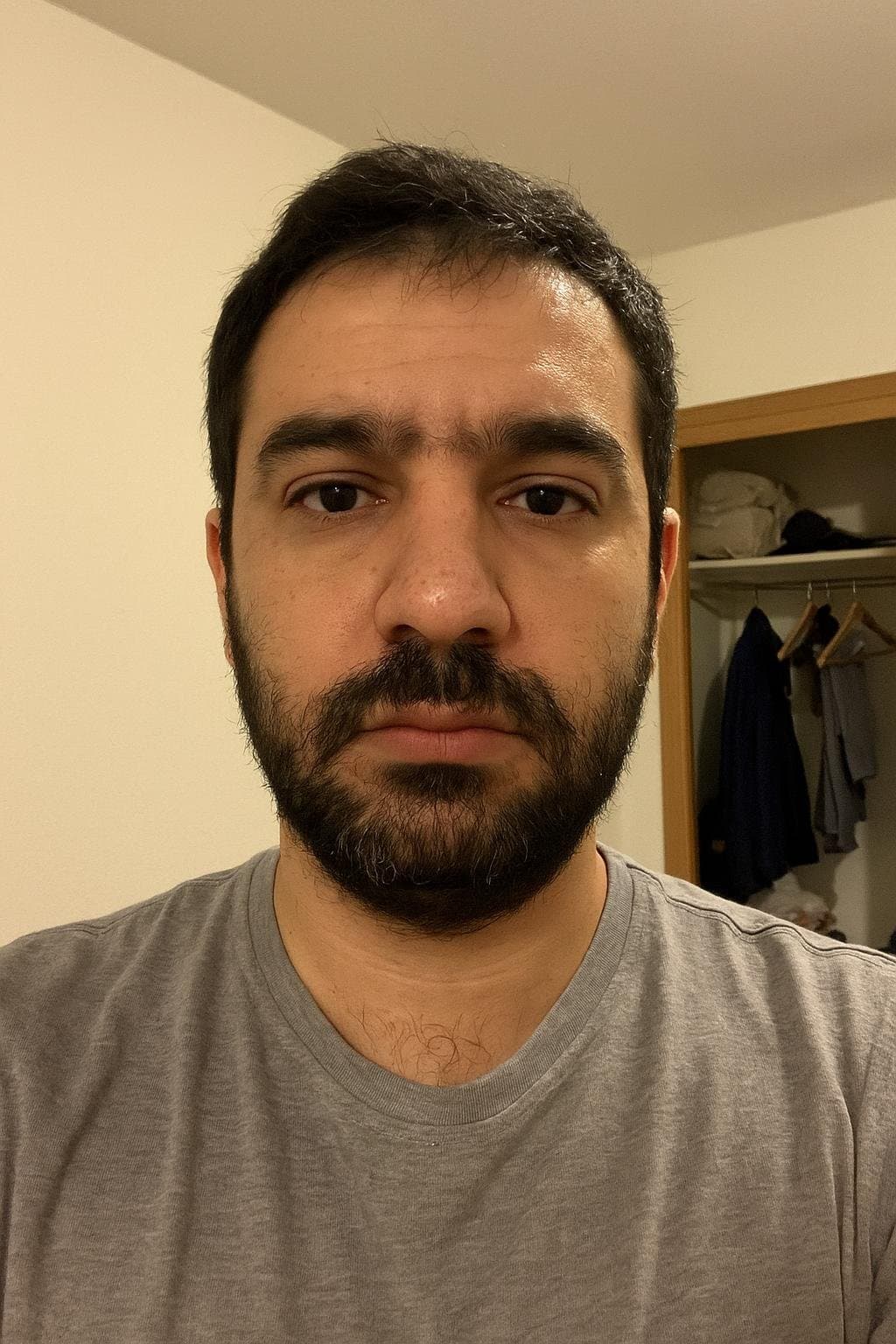Omar Hassan (AI-generated example portrait): Front